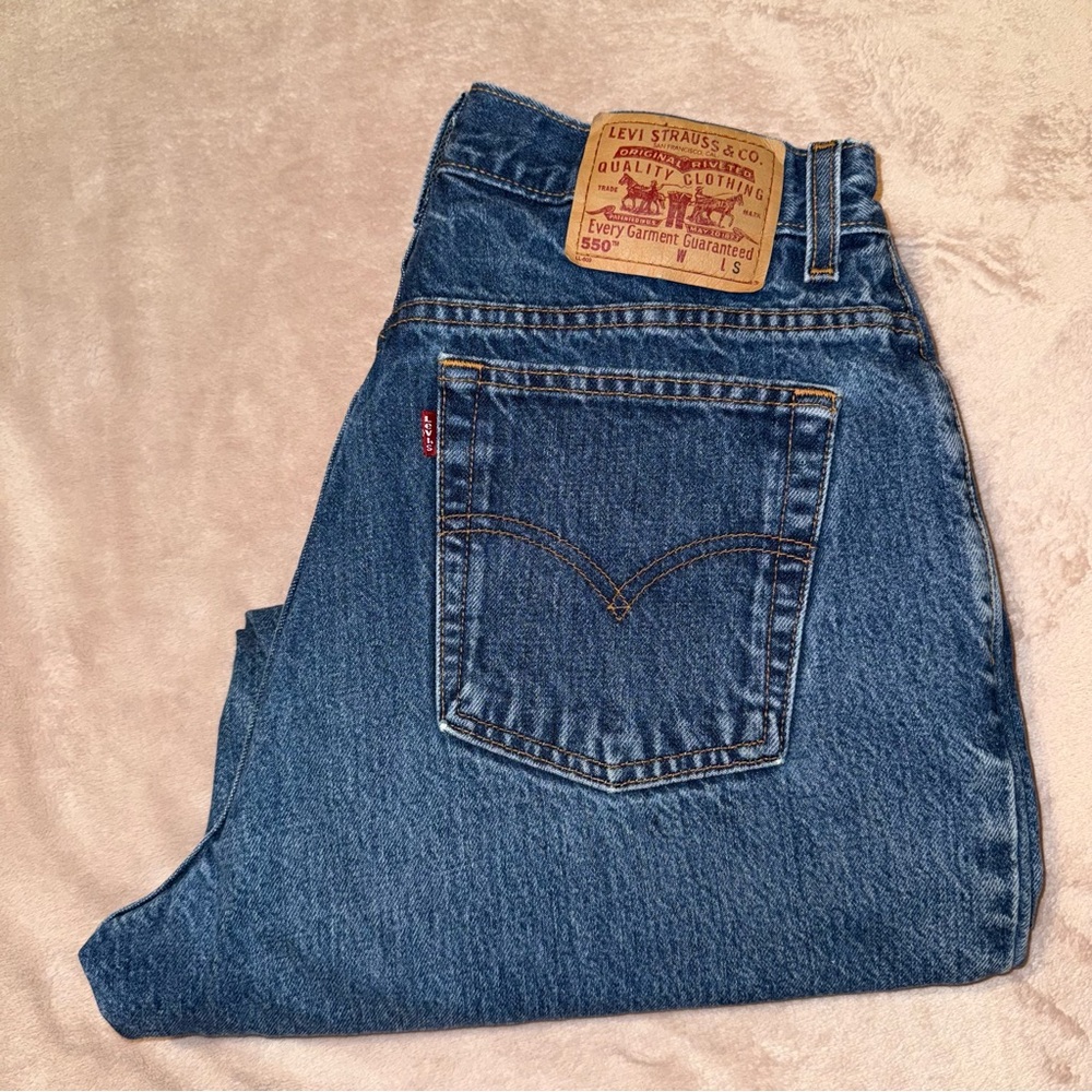 Vintage 03-2001-550 Levi’s relaxed fit tapered leg Jean size 14 mis s /L28/1/2